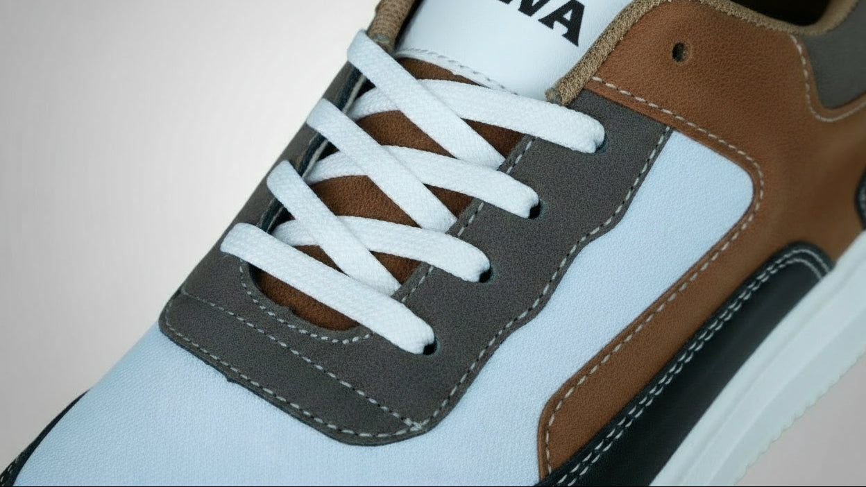 high-end commercial product zoomed photography of ZAWA sneakers, on a seamless light gray backdrop, soft studio lighting, clean reflections, subtle shadows, premium lifestyle vibe, ultra-sharp focus, 3D depth, realistic texture details