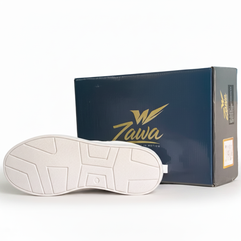 White shoe sole in front of a Zawa branded box on a white background