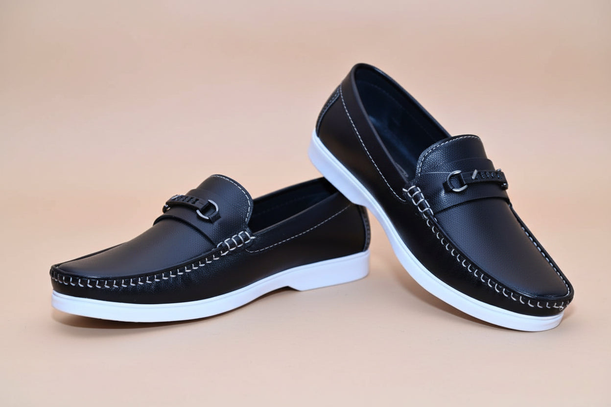 ZAWA Regent Black leather loafers with white soles on a plain background.