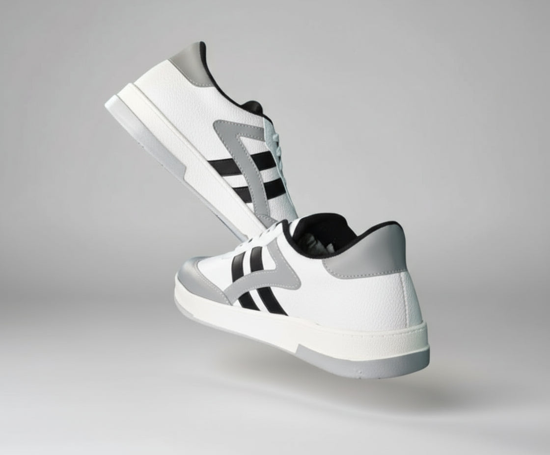 White ZAWA Skydrift sneakers with black and gray accents on a gray background