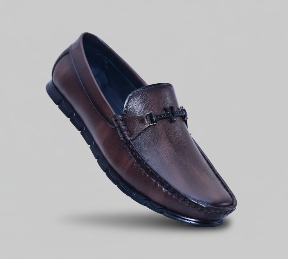 Zawa Valoris Black loafer shoe on a plain surface with light background 