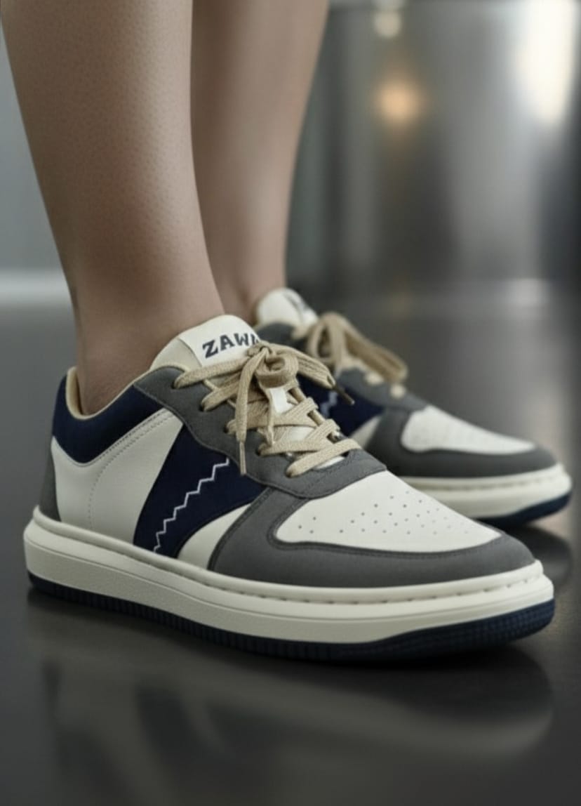Shadow Dune sneakers with 'Zawa' branding on a blurred background