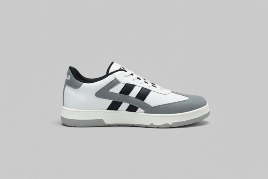 White and gray zawa skydrift sneaker with black stripes on a light gray background