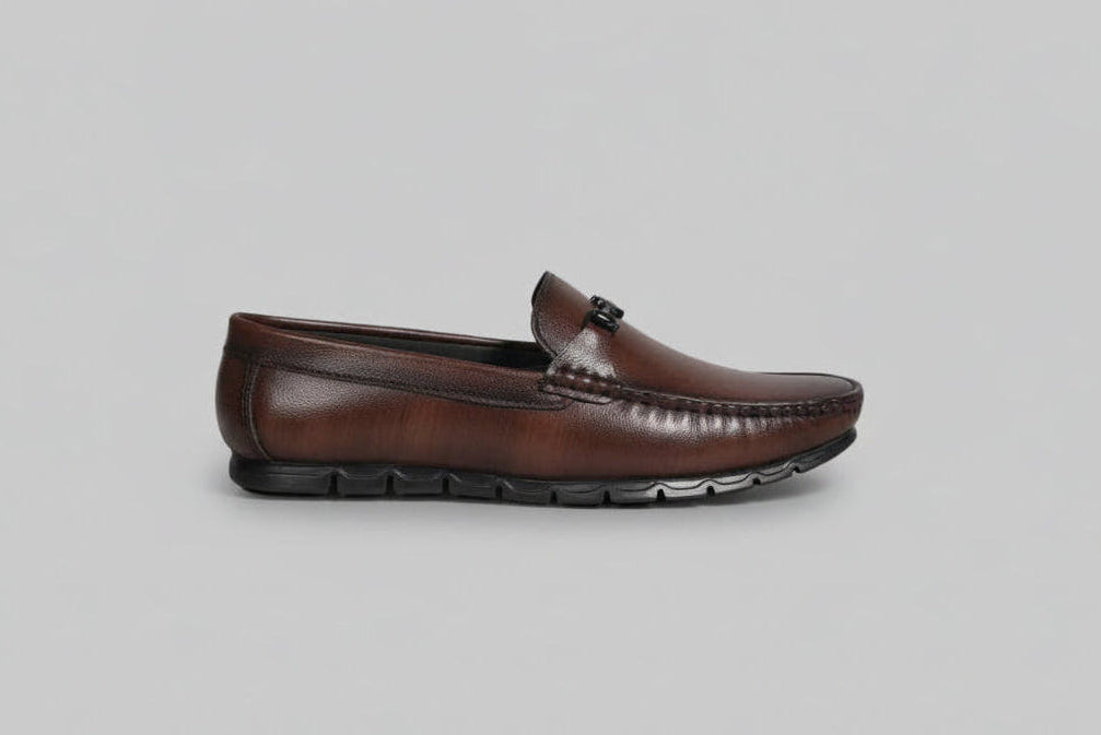 Brown leather zawa valoris loafer on a gray background